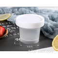 Plastica con coperchi rosa e bianchi usa e getta